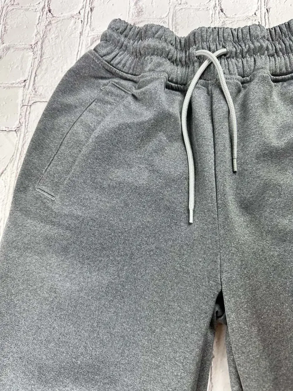 The North Face Mountain Athletics Fleece Jogger Sweatpants in Gray